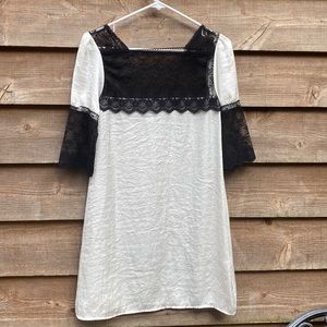Dress cream with black lace